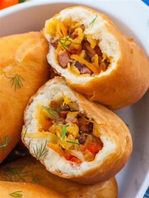  Pirozhki: Savoureux Pastries Filled With Juicy Meat and Creamy Cabbage for a Delicious Russian Feast!